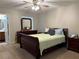 Warm and inviting bedroom featuring a queen-sized bed and natural light at 6490 Emerald Pointe Circle, Atlanta, GA 30349