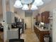 Updated kitchen featuring granite counters, stainless appliances, and eat-in breakfast area at 6490 Emerald Pointe Circle, Atlanta, GA 30349