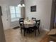 Bright eat-in kitchen with an 'Amen' wall sign and neutral decor at 6490 Emerald Pointe Circle, Atlanta, GA 30349
