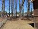 Spacious, tree-lined backyard at 6675 Hidden Brook Trl, Atlanta, GA 30349