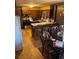 Cozy kitchen with breakfast bar and dining table at 6675 Hidden Brook Trl, Atlanta, GA 30349