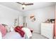Bedroom with plush carpet, neutral walls, and decorative mirror and wall art at 3610 Central Park Dr, Loganville, GA 30052