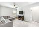 Bright bonus room offering comfortable living space and a media center at 3610 Central Park Dr, Loganville, GA 30052