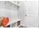 Mudroom entrance with a bench, cubbies, hooks, and storage baskets for easy organization at 3610 Central Park Dr, Loganville, GA 30052