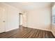 Bedroom featuring dark floors and natural light at 1105 S Parkwood Dr, Forest Park, GA 30297