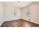 Cozy bedroom with hardwood floors, natural light, and neutral walls at 1105 S Parkwood Dr, Forest Park, GA 30297