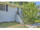 Inviting front entrance with concrete steps, iron railing, and storm door at 1105 S Parkwood Dr, Forest Park, GA 30297