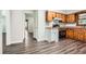 Traditional eat-in kitchen with stainless steel appliances and wood cabinets at 1105 S Parkwood Dr, Forest Park, GA 30297