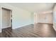 Bright living room featuring modern floors and neutral walls at 1105 S Parkwood Dr, Forest Park, GA 30297