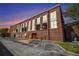 Beautiful brick exterior showcasing expansive windows and balcony feature for a unique living experience at 1133 Church St # 1, Covington, GA 30014