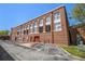 Beautiful brick exterior showcasing expansive windows and balcony feature for a unique living experience at 1133 Church St # 1, Covington, GA 30014