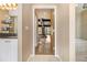 Hallway showcases views of the bath and bedroom, highlighting the home's cohesive design elements at 1133 Church St # 1, Covington, GA 30014