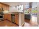 Modern kitchen featuring stainless steel appliances and an open layout flowing into the living area at 1133 Church St # 1, Covington, GA 30014
