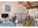 Spacious loft area with exposed beam ceilings, hardwood floors, and natural light at 1133 Church St # 1, Covington, GA 30014