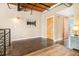 Loft with concrete floors, modern railing, doors, and views at 1133 Church St # 1, Covington, GA 30014