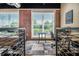 Well-lit office area with a view of green trees through the large windows at 1133 Church St # 1, Covington, GA 30014