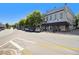 Street-level view of a charming storefront with awning and street parking at 1133 Church St # 1, Covington, GA 30014