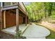 Concrete patio under deck, providing a shady spot in the backyard at 3100 Queens Ne Walk, Atlanta, GA 30345