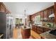 Well-equipped kitchen with stainless steel appliances, granite countertops, and an island at 3100 Queens Ne Walk, Atlanta, GA 30345