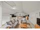 Upstairs bonus room features an open plan with a seating area and dining area at 3100 Queens Ne Walk, Atlanta, GA 30345
