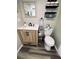 Bathroom featuring a wood vanity with a white countertop and sleek black fixtures at 5400 Kings Camp Rd, Acworth, GA 30102