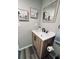 Bathroom featuring a sink and wood-look flooring at 5400 Kings Camp Rd, Acworth, GA 30102