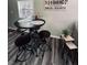 Modern dining area with stylish high-top table and chairs, plus accent tables at 5400 Kings Camp Rd, Acworth, GA 30102