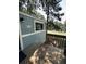 Exterior porch with wooden deck, offering scenic views and access to the outdoors at 5400 Kings Camp Rd, Acworth, GA 30102
