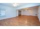 Living room featuring hardwood floors, recessed lighting, and a ceiling fan at 5650 Upper Creek Ct, Suwanee, GA 30024