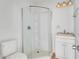 Bright bathroom featuring a corner shower, modern vanity, and clean finishes at 934 Joseph E Boone Nw Blvd, Atlanta, GA 30314