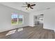 Bright living room with wood floors, recessed lights, and white walls at 934 Joseph E Boone Nw Blvd, Atlanta, GA 30314