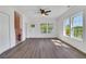 Bright living room features wood floors, white walls, and a decorative fireplace at 934 Joseph E Boone Nw Blvd, Atlanta, GA 30314