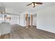 Bright open living room with light hardwood floors and an open concept kitchen at 934 Joseph E Boone Nw Blvd, Atlanta, GA 30314
