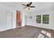 Bright living room featuring wood floors, white walls, and a decorative fireplace at 934 Joseph E Boone Nw Blvd, Atlanta, GA 30314