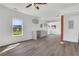 Spacious living room showcasing grey-toned flooring, a kitchen counter, and an open concept at 934 Joseph E Boone Nw Blvd, Atlanta, GA 30314
