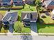 Aerial view showcases home with manicured lawns, mature trees, and a well-maintained neighborhood at 368 Sawyer Meadow Way, Grayson, GA 30017