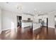 Modern kitchen featuring white cabinets, stainless steel appliances, and a central island at 368 Sawyer Meadow Way, Grayson, GA 30017