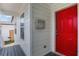 Close-up featuring a red front door, showcasing a charming entryway with bright and inviting colors at 944 Joseph E Boone Nw Blvd, Atlanta, GA 30314