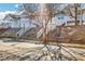 Street view showcasing charming homes with elevated front entrances and white picket fences at 944 Joseph E Boone Nw Blvd, Atlanta, GA 30314