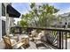 Outdoor balcony with comfortable seating, perfect for relaxing and enjoying the view at 11265 Musette Cir, Alpharetta, GA 30009