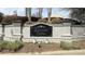 Attractive Westside Villas community sign with detailed stonework and landscaping at 11265 Musette Cir, Alpharetta, GA 30009