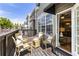 Inviting outdoor deck features wood flooring, comfortable seating, and scenic neighborhood views, perfect for relaxation at 11265 Musette Cir, Alpharetta, GA 30009