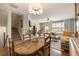 Open-concept living and dining area, with stairs to the second floor at 11265 Musette Cir, Alpharetta, GA 30009