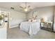 Inviting main bedroom features vaulted ceiling, soft carpet, neutral color scheme, and ample natural light at 11265 Musette Cir, Alpharetta, GA 30009