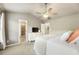 Spacious main bedroom with vaulted ceilings, neutral tones, and en-suite bathroom, perfect for relaxation and privacy at 11265 Musette Cir, Alpharetta, GA 30009