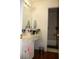 Bathroom with a marble countertop, a built-in vanity, and an adjacent shower and tub at 1211 Liverpool Pointe, Lawrenceville, GA 30046