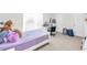 Bedroom with a white bed, a white desk, and a window with blinds at 1211 Liverpool Pointe, Lawrenceville, GA 30046