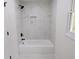 Bathroom featuring a tub and shower combo with gray tile at 2863 Landing Dr, Marietta, GA 30066