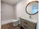 Bathroom featuring a vanity with a wooden cabinet, toilet, and a shower at 2863 Landing Dr, Marietta, GA 30066