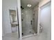 Modern bathroom featuring glass shower with stone floor and updated fixtures at 2863 Landing Dr, Marietta, GA 30066